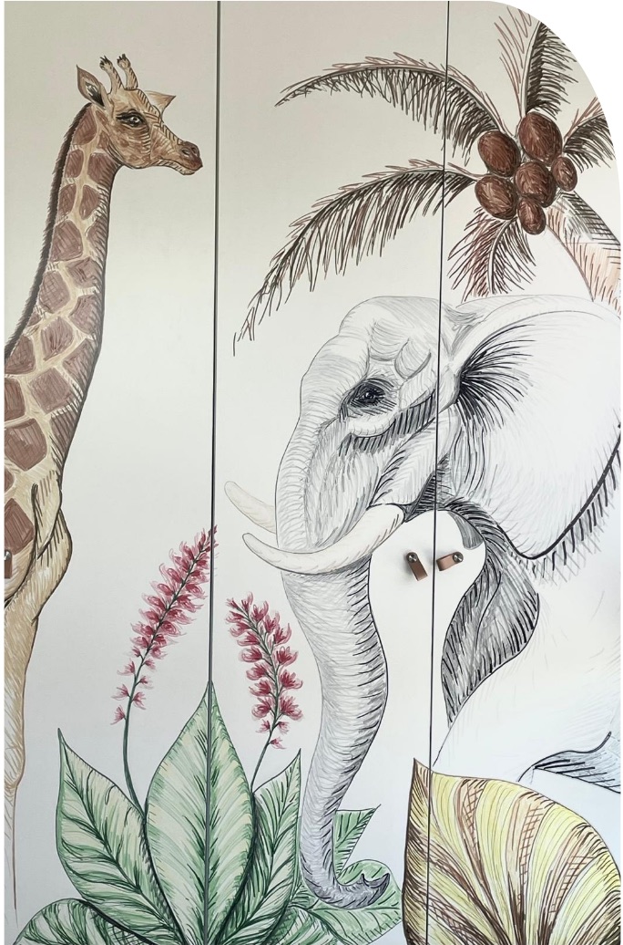 Girafe et éléphant dessinés sur les portes d'un meuble